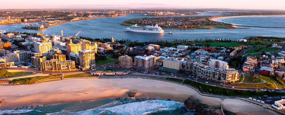 A beautiful beach and city view where Amelior's insulation installers in Newcastle service. Image Courtesy: TripAdvisor